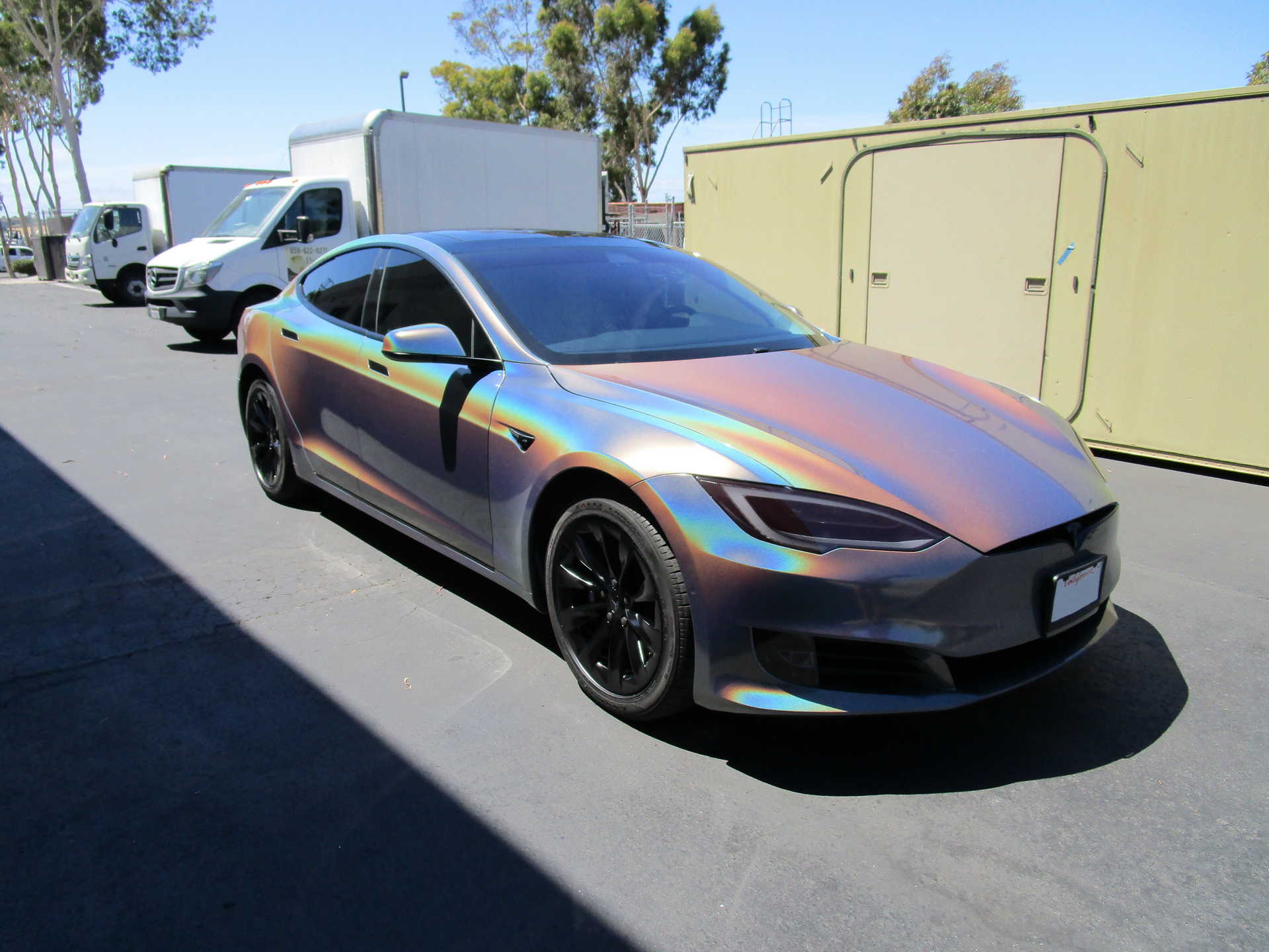 Tesla Model S Rainbow Chrome Color Flip - San Diego Vinyl Wrap & San Diego  Window Tinting