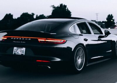 Black Porsche Panamera showing the deep gloss of a fresh ceramic coating